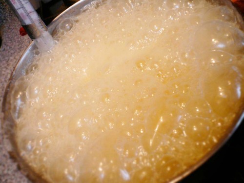 Boil the sugar to 240-260 degrees F