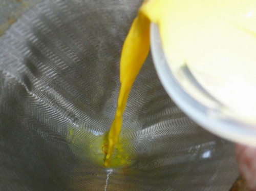 Straining the saffron-infused goat milk
