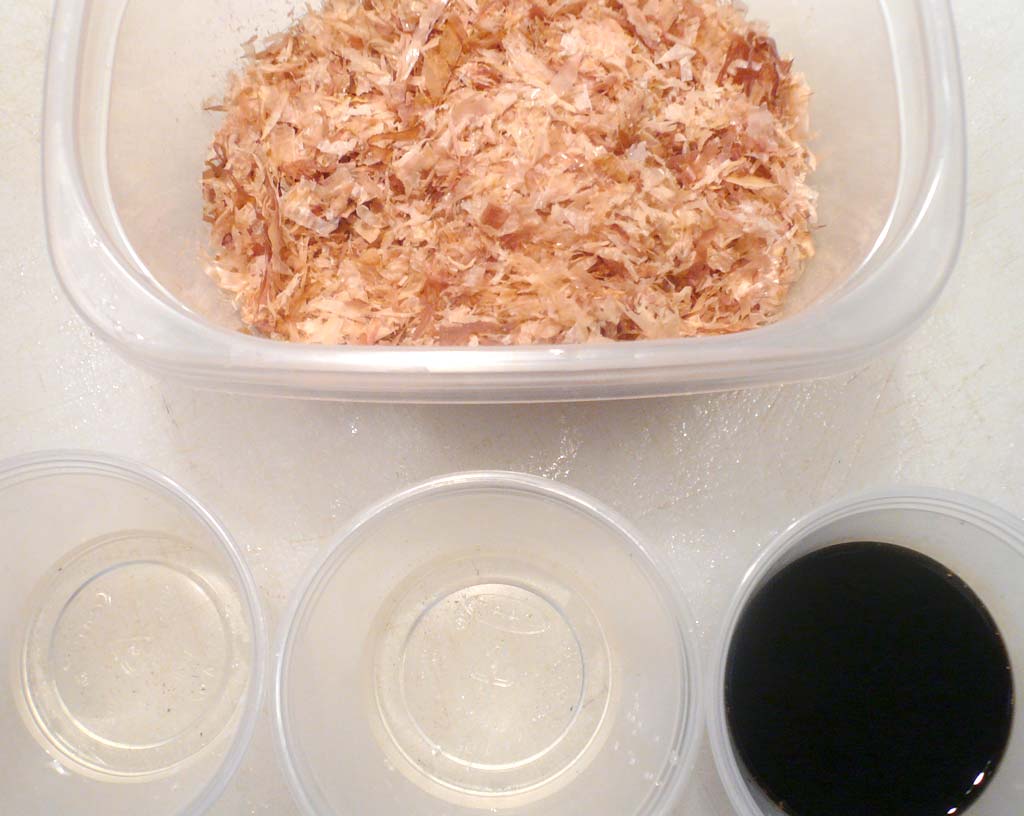 Mise en place: bonito flakes, mirin, rice vinegar and soy.